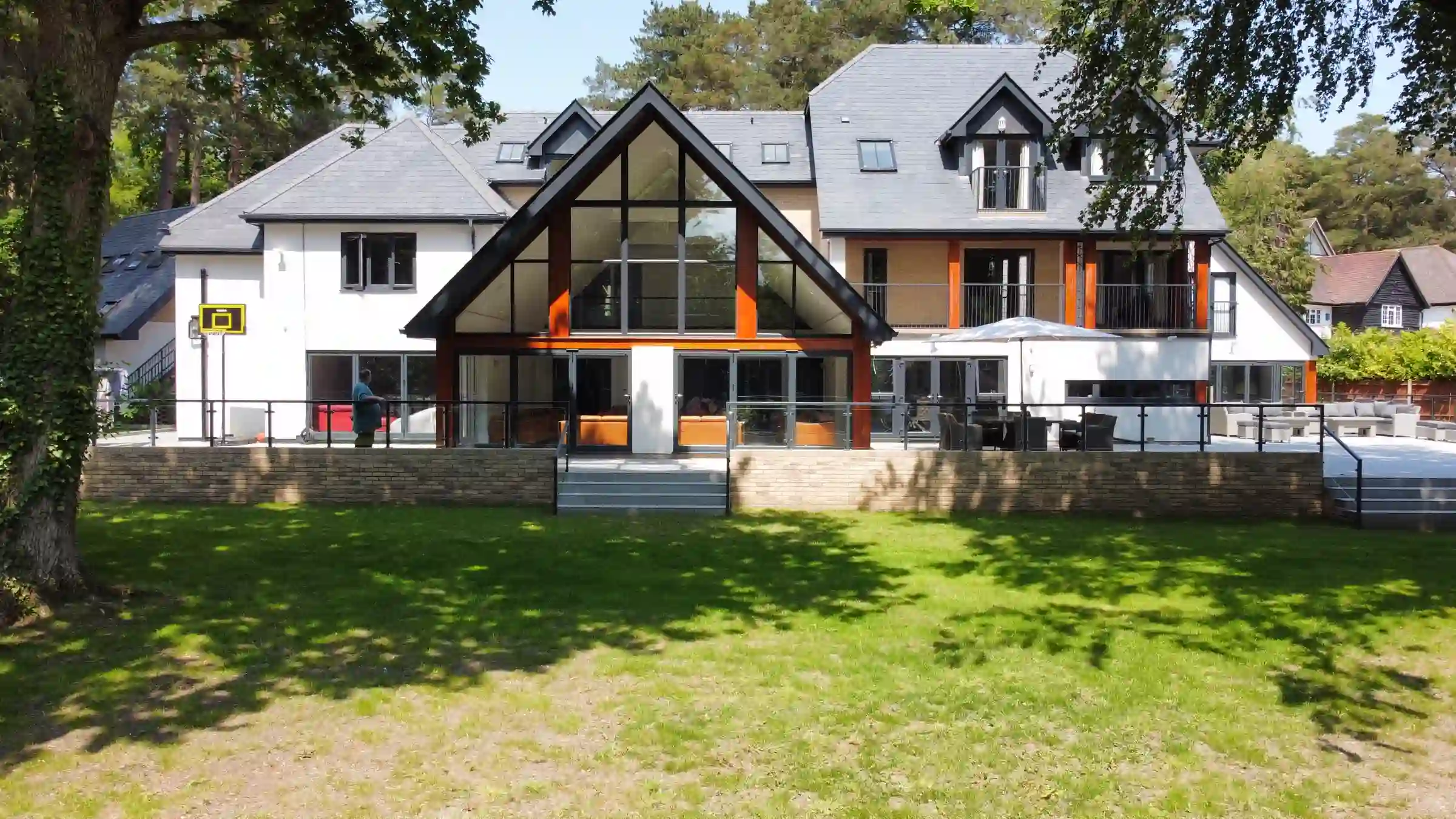 Large family home with a full-height glazed gable extension, glazing fitted by Itchen Glass and Glazing