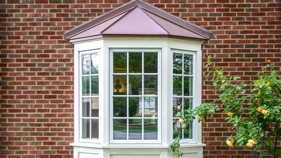 Bay window with hipped roof detail